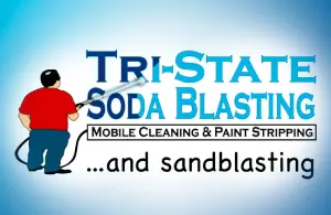 A man holding a hose with the words tri-state soda blasting on it.